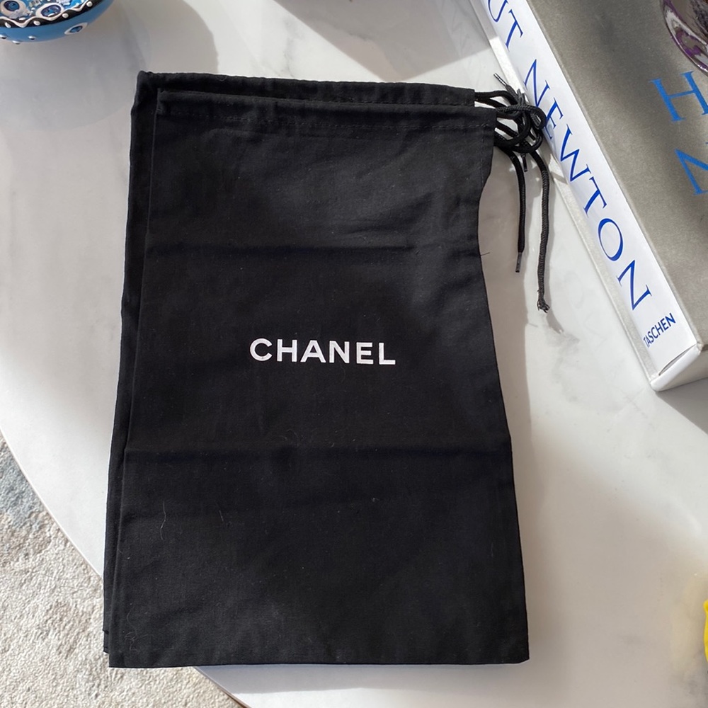 One Chanel dust bag